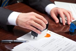 Lawyer Signing a Legal Document